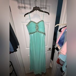 size 8 prom dress. green with silver gems.